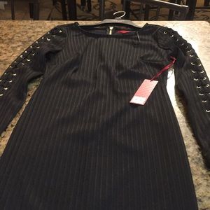 Jennifer Lopez stretchy black dress size 8